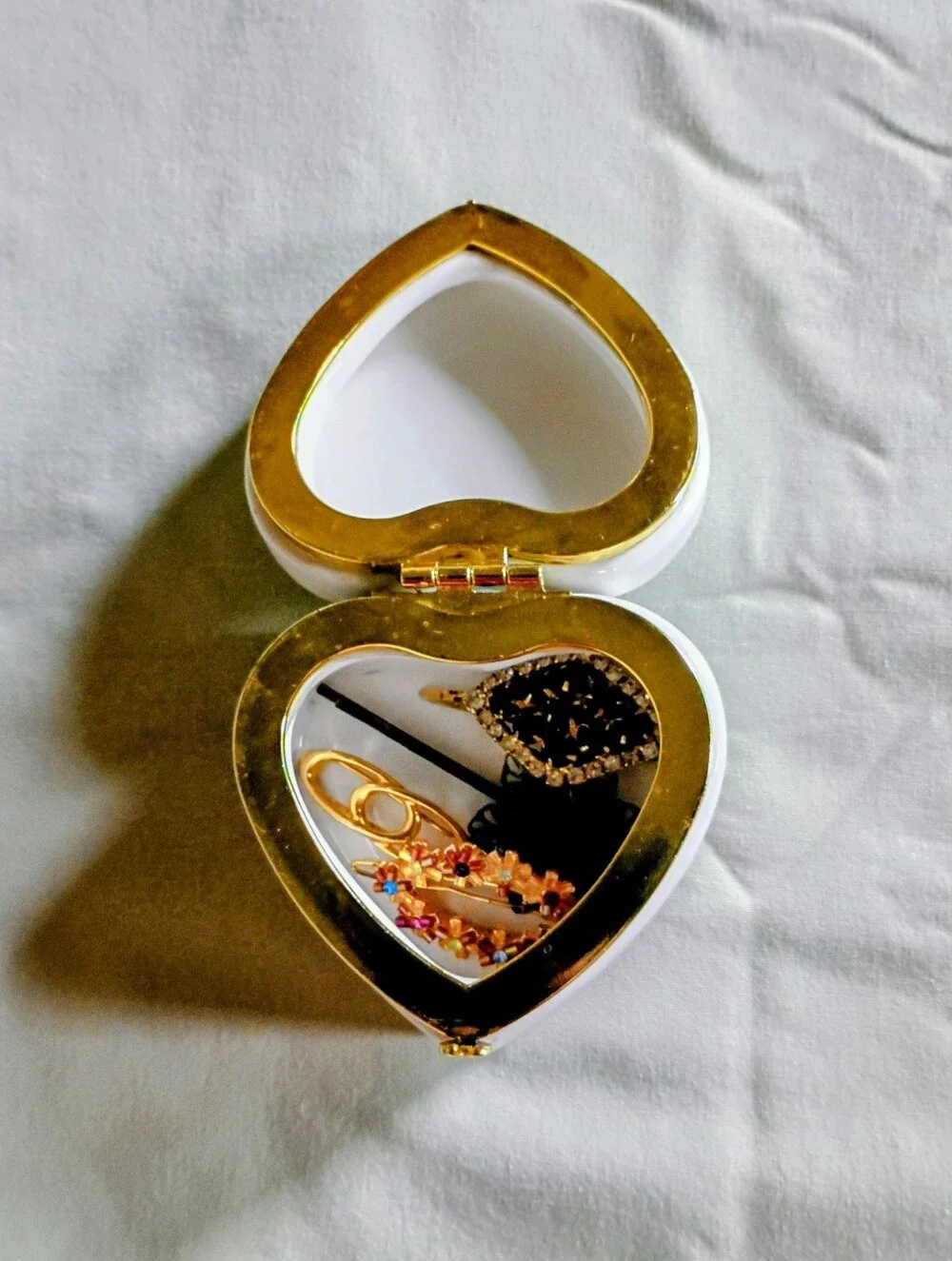 6 Hair accessories and 1 Heart shaped Trinket Box